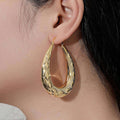 Premium Gold 50mm Oval Diamond Pattern Creole Hoop Earrings